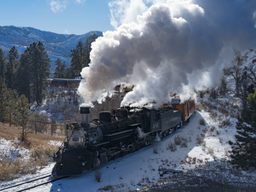 The Durango-Silverton Train billows with steam along its 26-mile winter trek to Cascade Canyon.